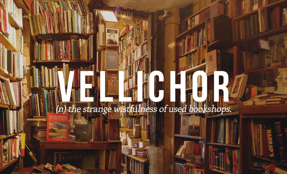A piece of wordart from Buzzfeed with the word 'Vellichor' and its definiton, the strange wistfullness of used bookshops, imposed on a picture of a bookstore. 
