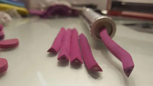 clay extrusion device and some clay tubes