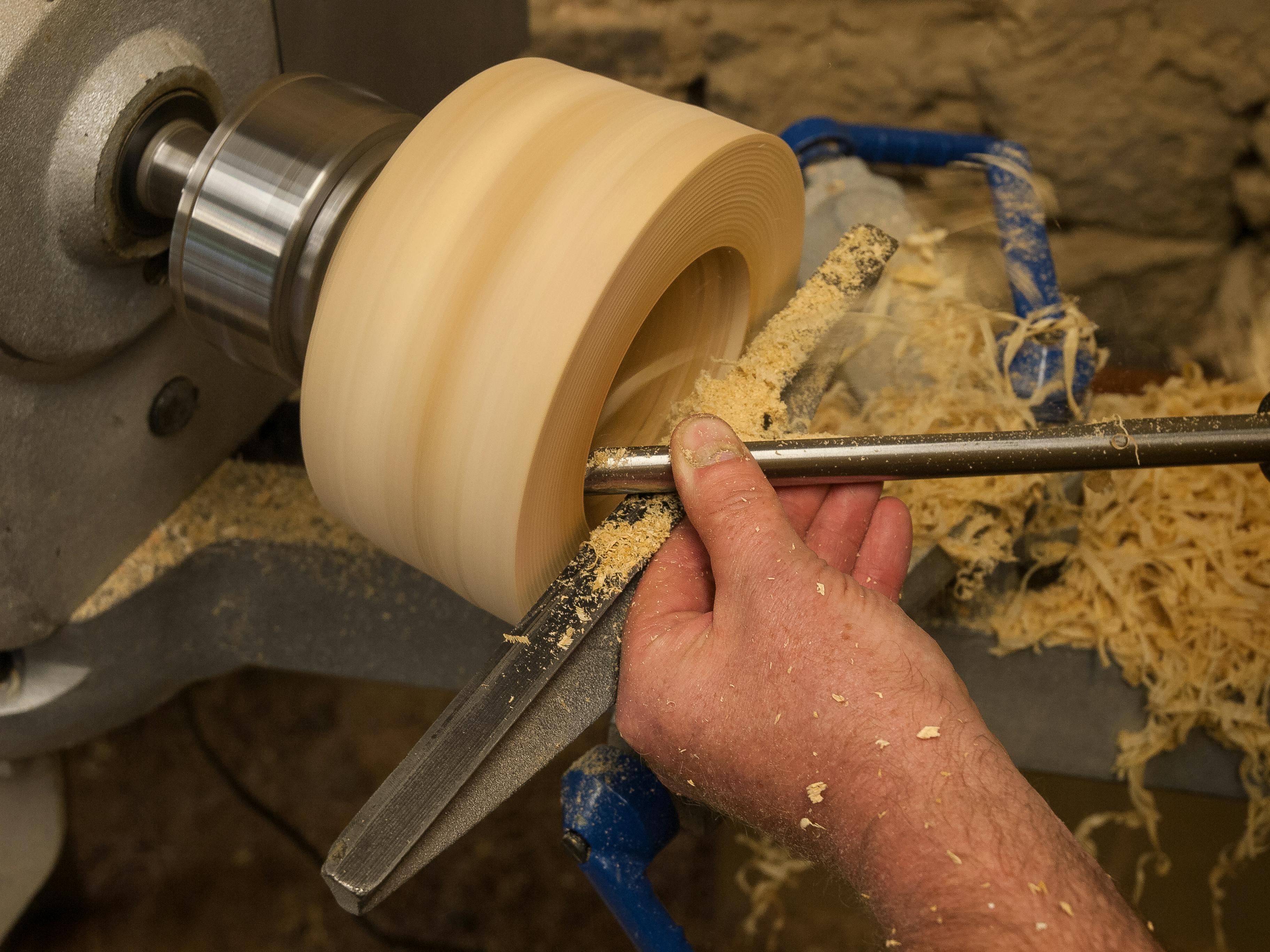 carpenter using a lathe