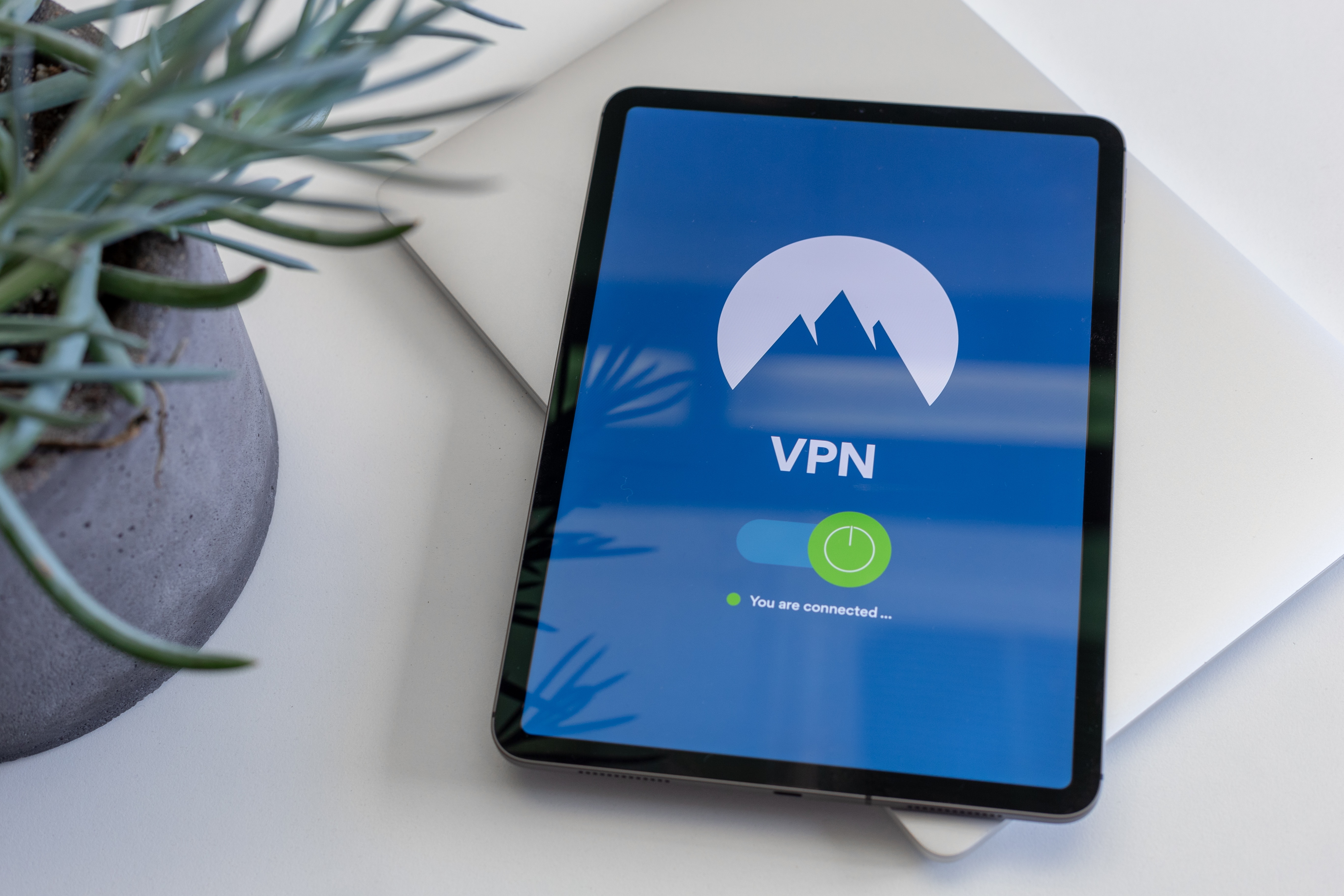An iPad that displays a connection to a Virtual Private Network (VPN)